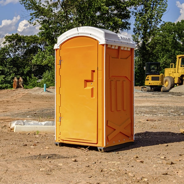 how often are the porta potties cleaned and serviced during a rental period in Lowland